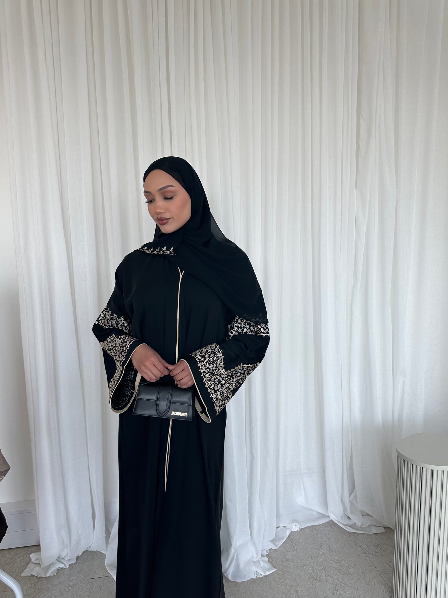 Layaan black embroidery buttoned abaya
