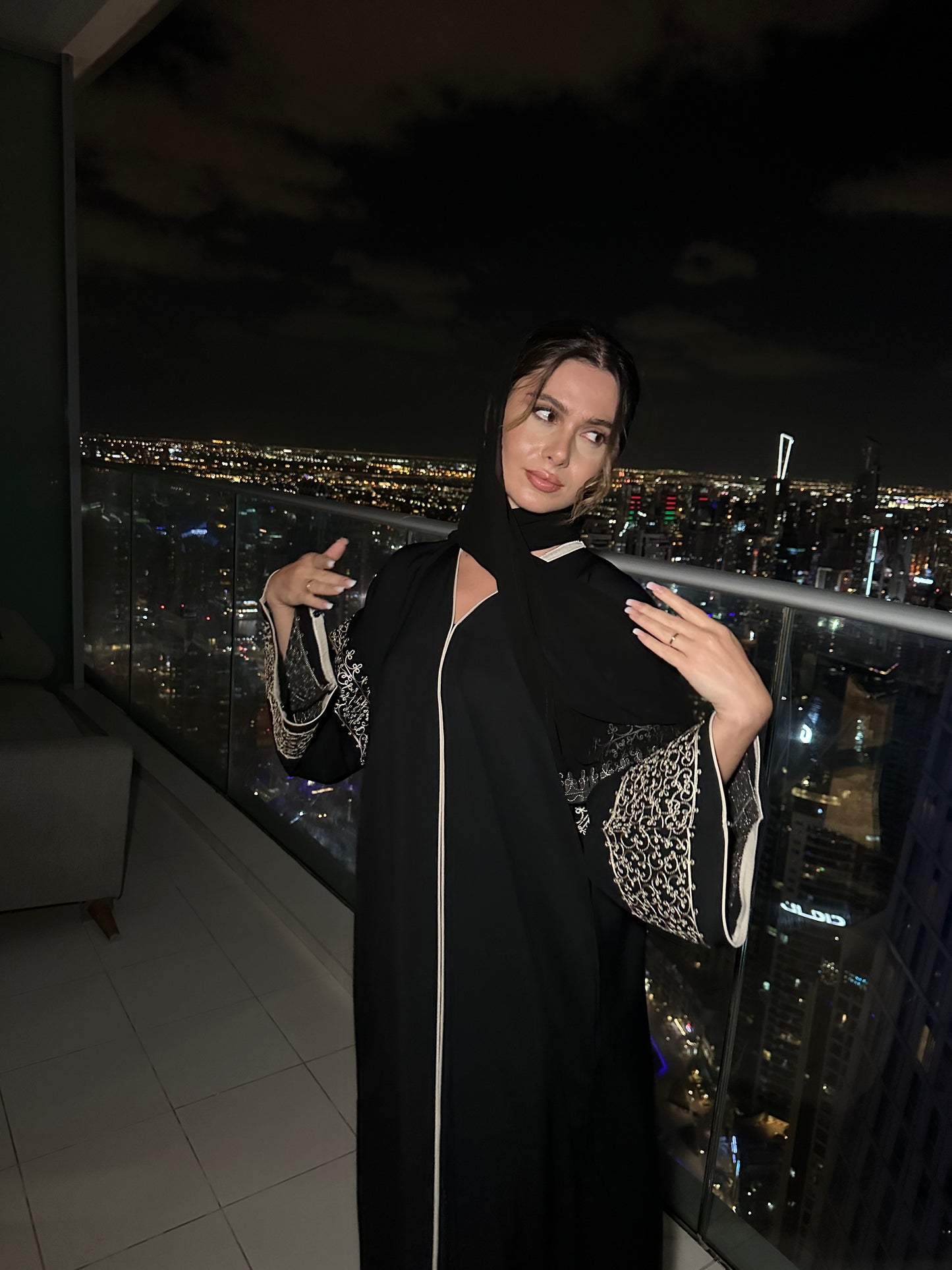 Layaan black embroidery buttoned abaya