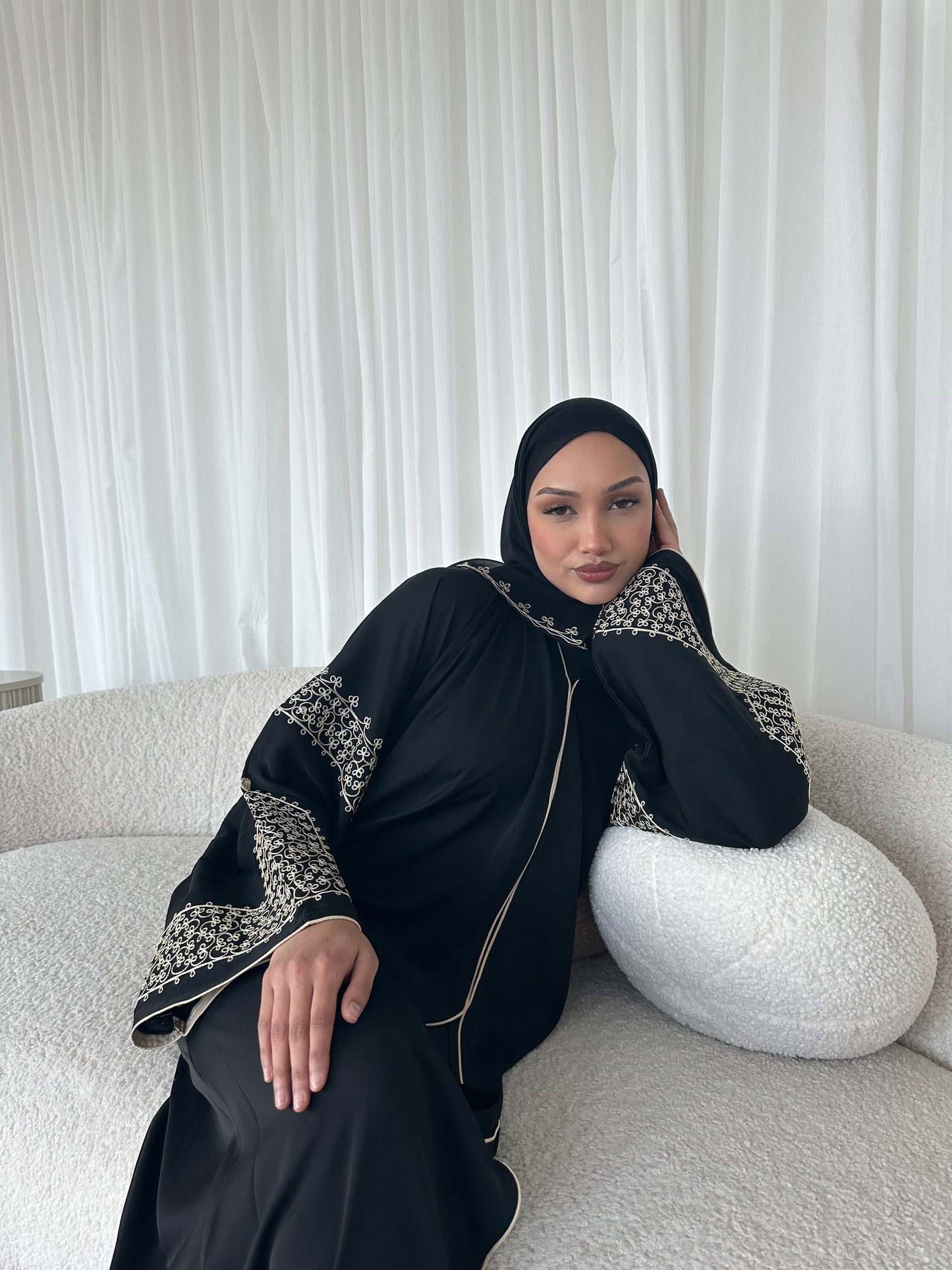 Layaan black embroidery buttoned abaya