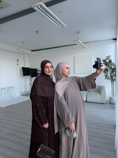 Khawla gem stones closed Eid abaya