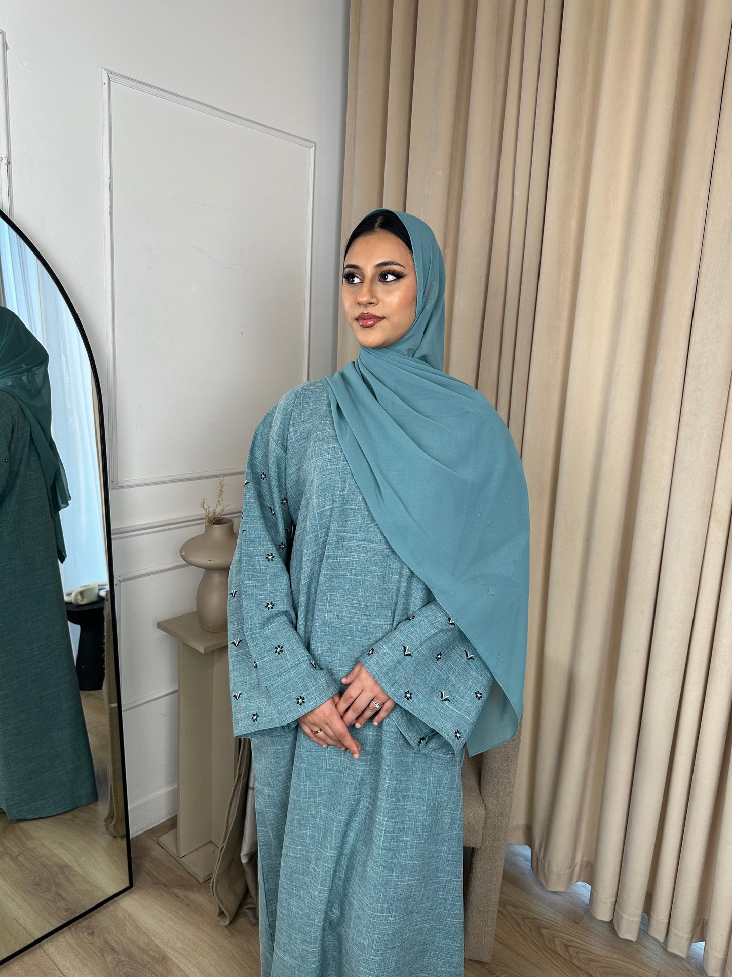 Husna linen embroidery sea blue abaya