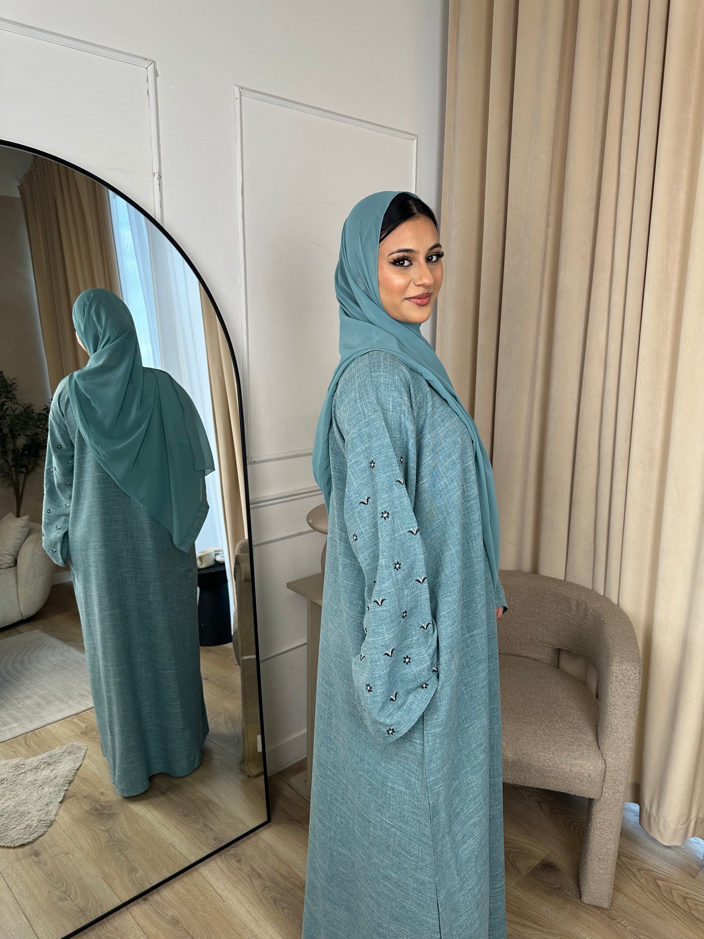 Husna linen embroidery sea blue abaya