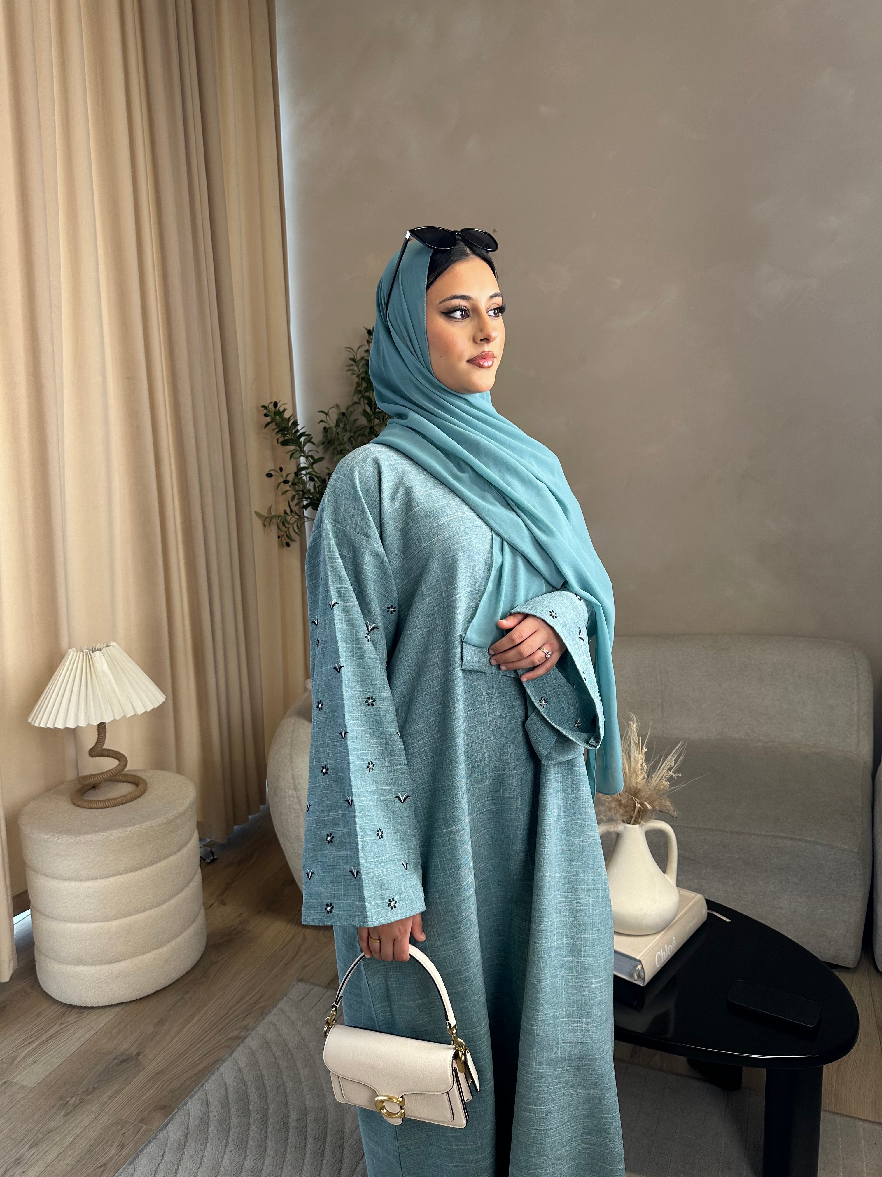 Husna linen embroidery sea blue abaya