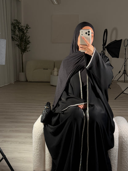 Aswad abaya- open nida abaya with silver lace