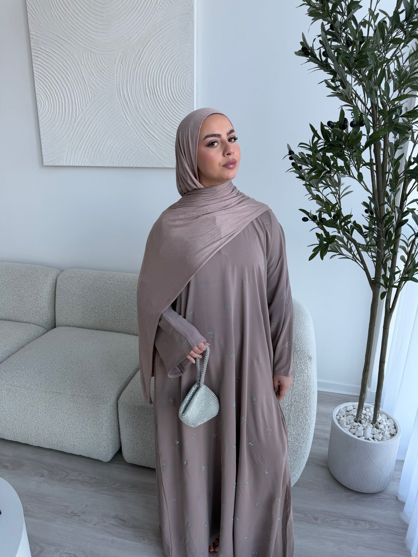 Khawla gem stones closed Eid abaya