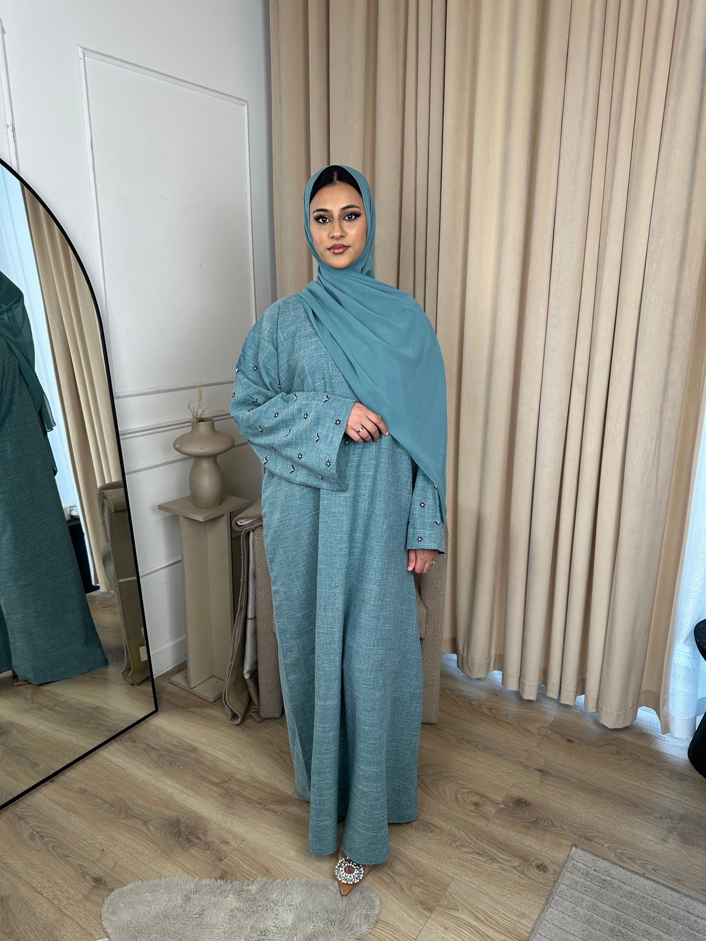 Husna linen embroidery sea blue abaya